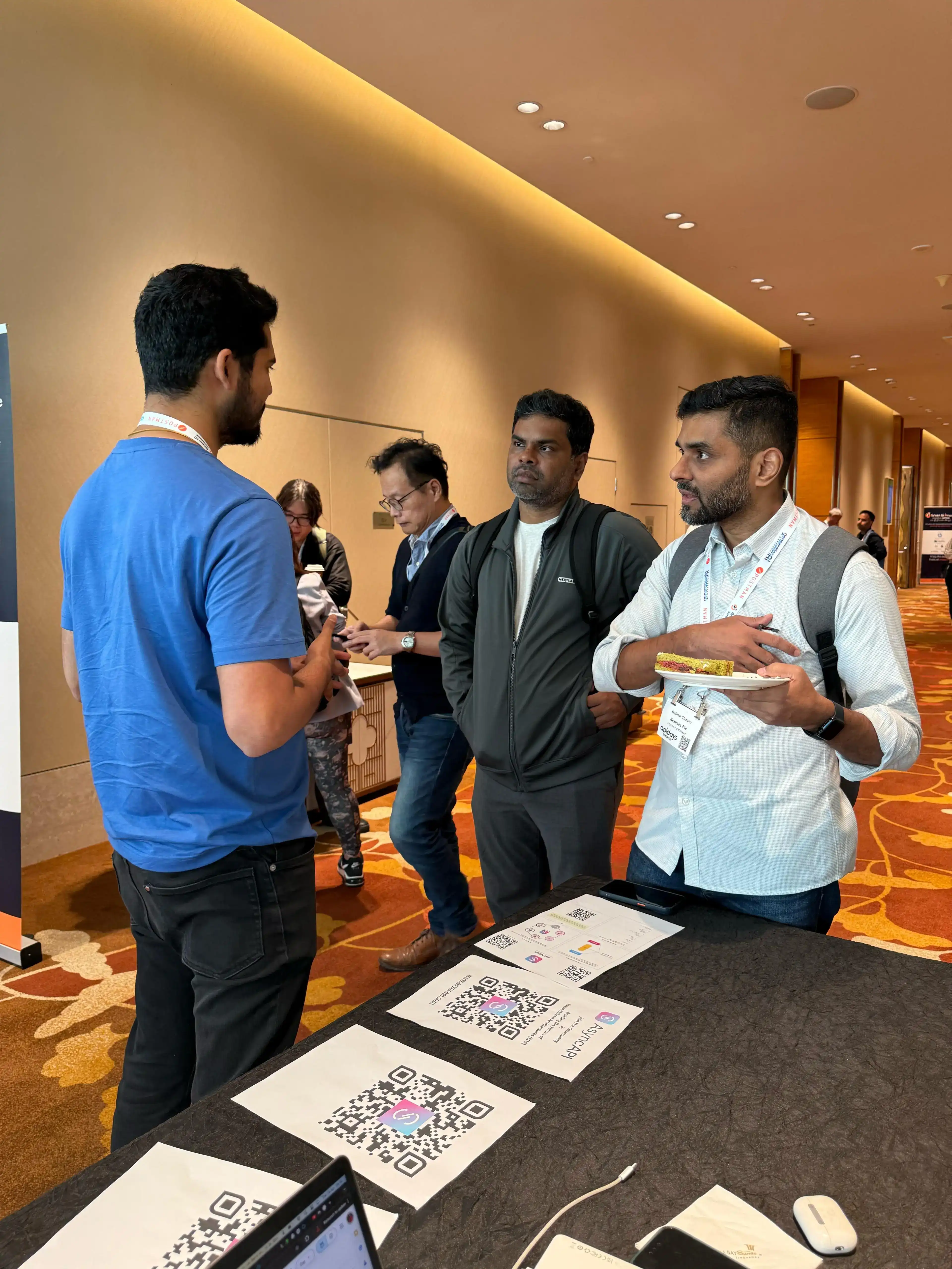 Ankit Interacting With The Audience at The Booth.